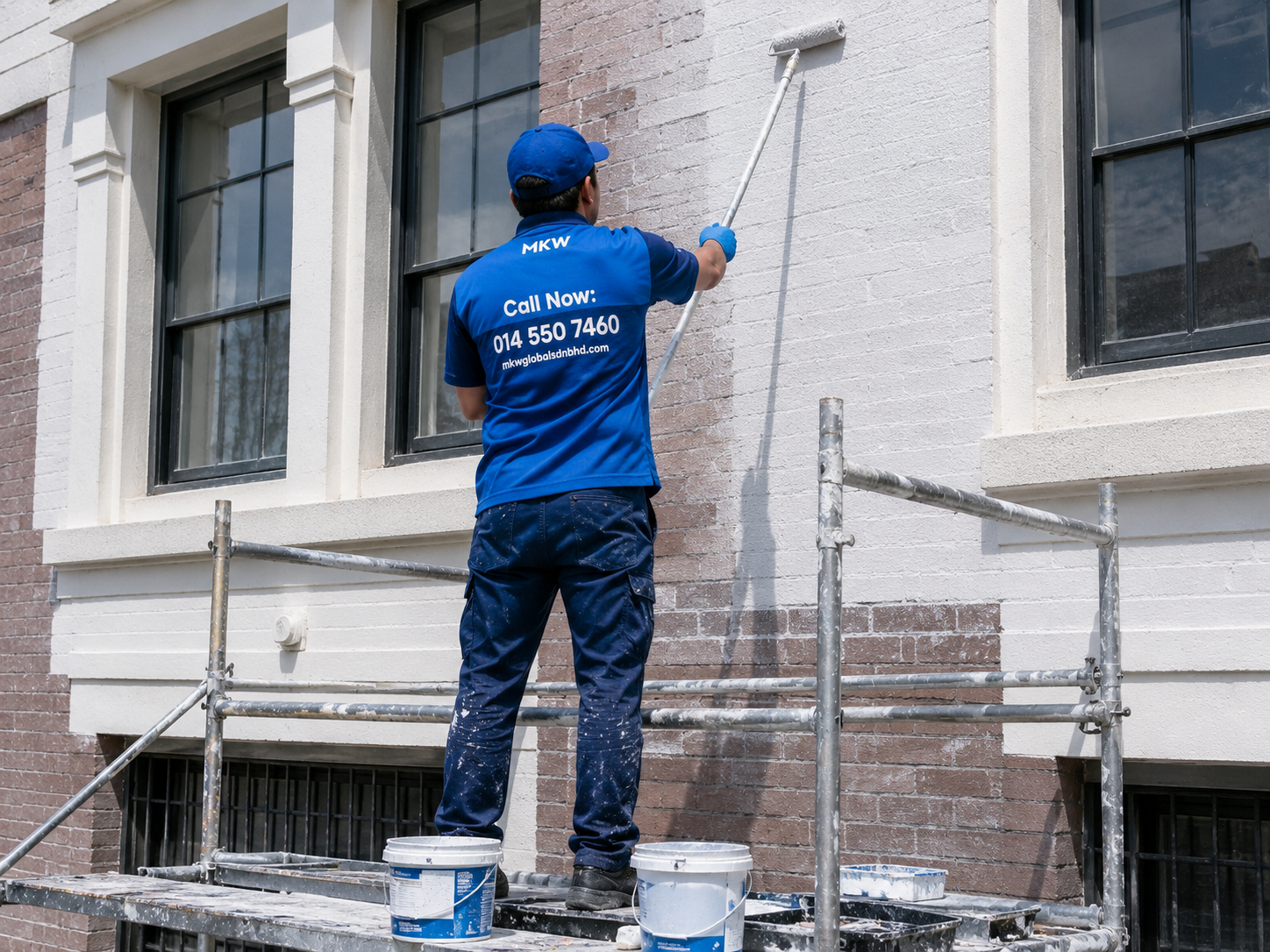 MKW Worker Painting Wall